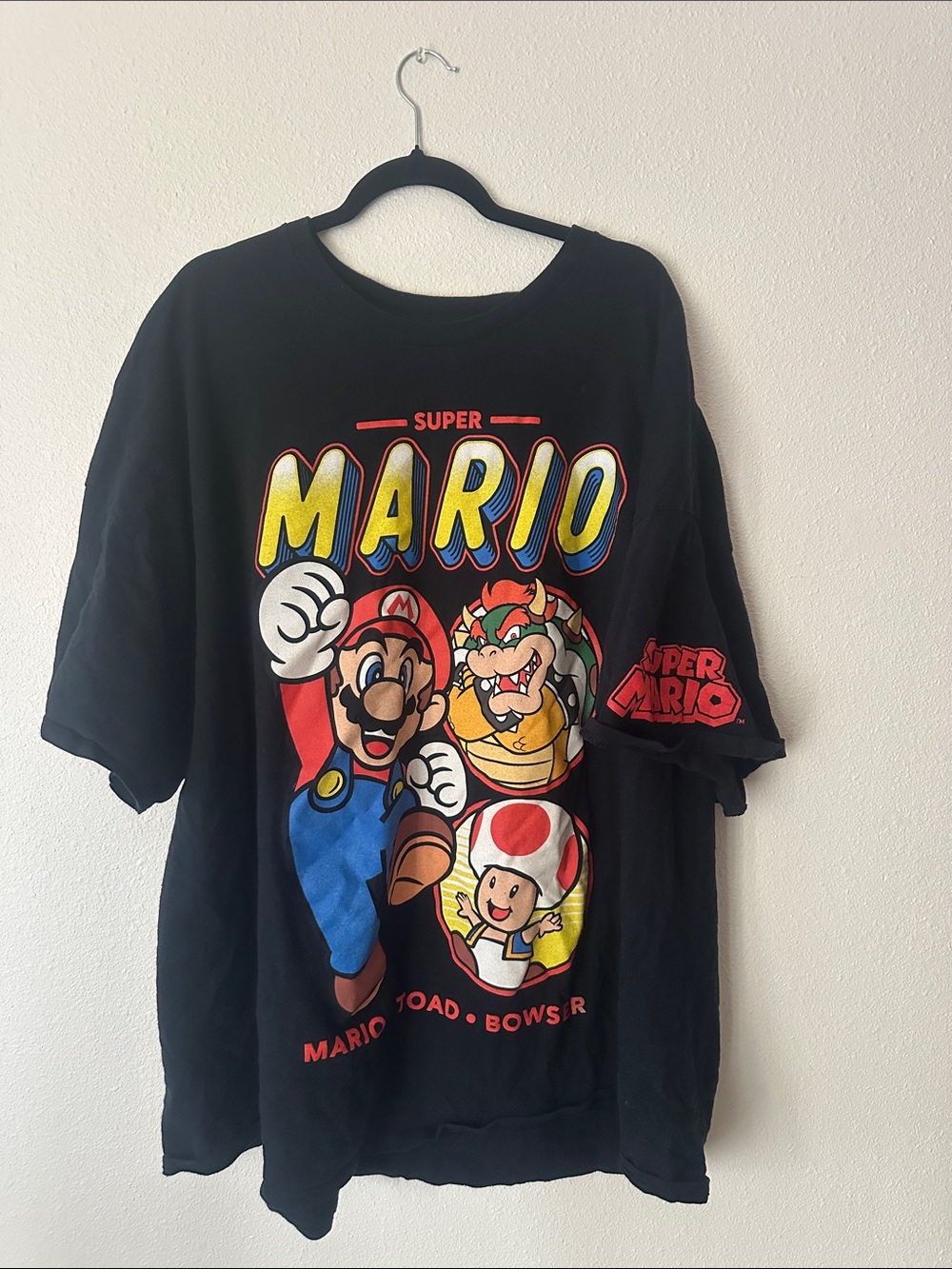 Nintendo Black Super Mario Graphic Tee with Yellow & Red Accents